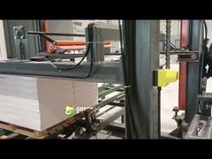 Operação de embalagem para toda a pilha de placas de gesso para teto